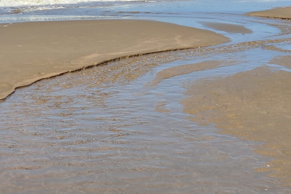 Slufter op het strand.